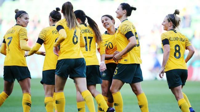 Matildas players celebrate Sam Kerr's early goal against Argentina 