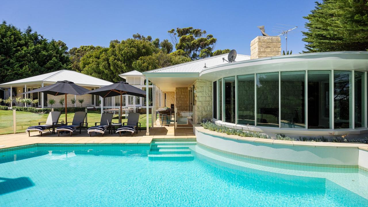 The house at 92 Campbells Rd, Portsea, features a pool and tennis court.