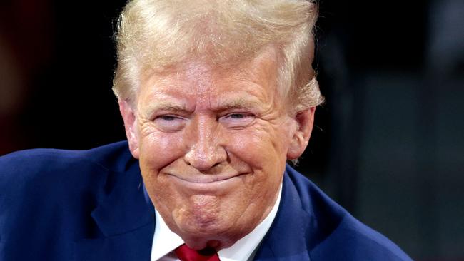 Former US President and Republican presidential candidate Donald Trump attends a town hall meeting moderated by Arkansas Governor Sarah Huckabee Sanders at the Dort Financial Center in Flint, Michigan, on September 17, 2024. (Photo by JEFF KOWALSKY / AFP)