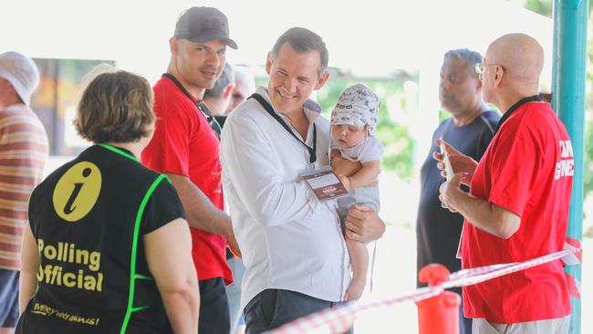 Chief Minister Michael Gunner and Son Hudson arrive at the Fannie Bay Electorate polling booth at Parap Primary School. Picture Glenn Campbell