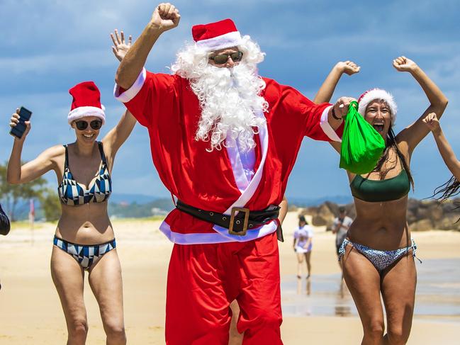 Christmas Day on the Gold Coast 2020.Santa Clause dropped past Coolangatta beach.Picture: NIGEL HALLETT