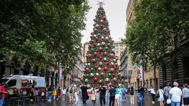 SYDNEY, AUSTRALIA: Newswire Photos: DECEMBER 24 2023: A view of the Christmas Tree on display in Martin Place in the CBD in Sydney as the grey wet weather continues today on Christmas Eve. Photo by: NCA Newswire/ Gaye Gerard