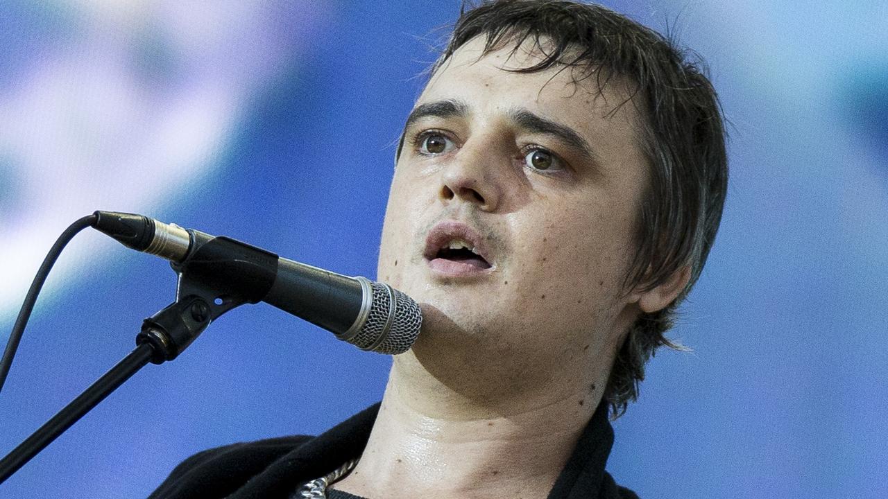 Pete Doherty had both his earlobes bitten off during his wild past. Pictured performing with The Libertines in 2014. Picture: Tristan Fewings/Getty Images