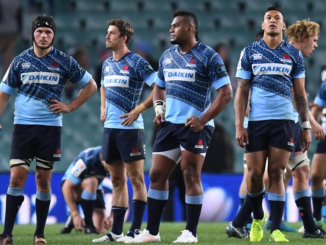 A dejected Waratahs after their loss to the Jaguares during the round 16 Super Rugby match between the NSW Waratahs and Argentina's Jaguares at Allianz Stadium in Sydney, Saturday, July 8, 2017.  (AAP Image/Dean Lewins) NO ARCHIVING