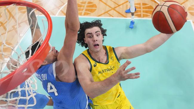 LILLE, FRANCE - AUGUST 02: (EDITORS NOTE: Image was captured using a remote camera positioned above the field of play) Josh Giddey #3 of Team Australia drives to the basket during the Men's Group Phase - Group A match between Team Australia and Team Greece on day seven of the Olympic Games Paris 2024 at Stade Pierre Mauroy on August 02, 2024 in Lille, France. (Photo by Pool/Getty Images)