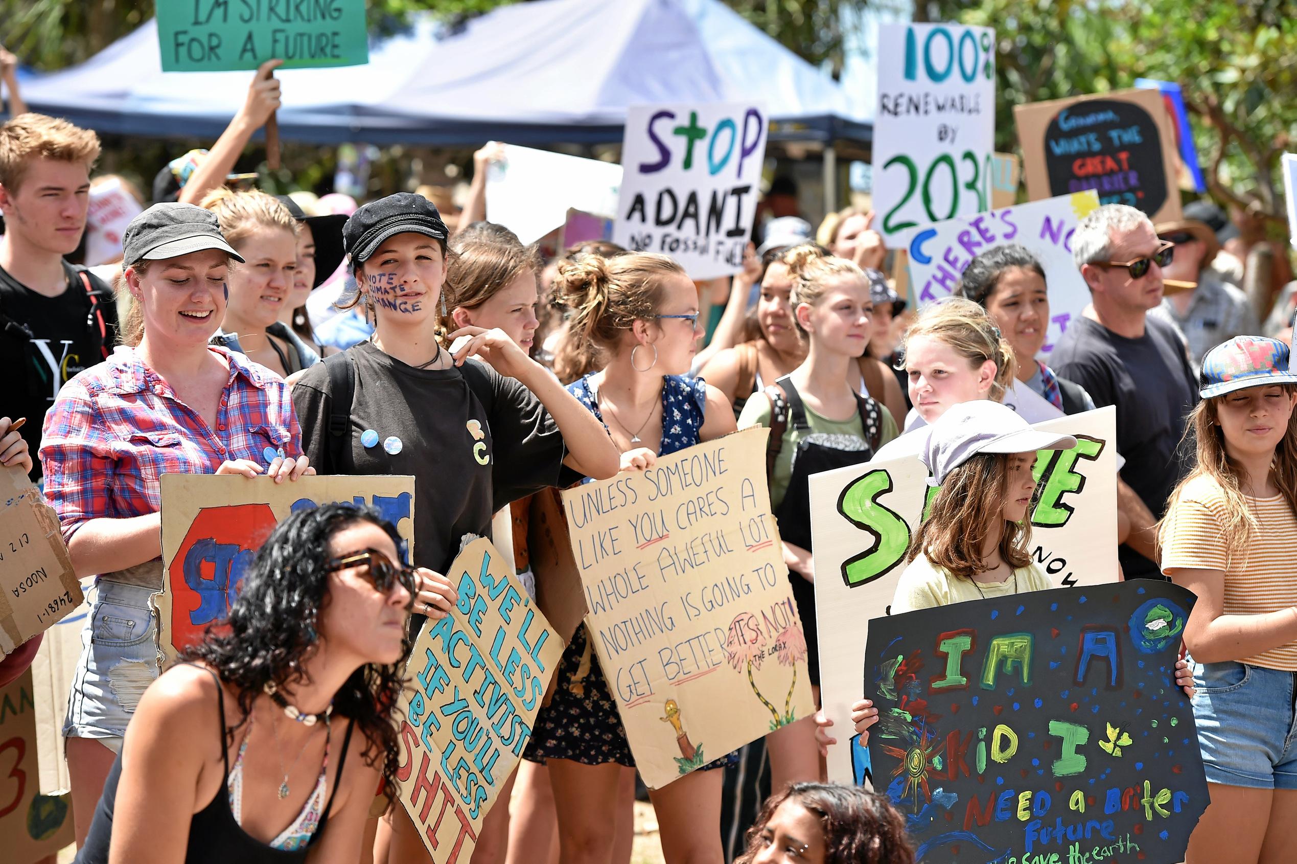 School students and community members gather at Peregain Beach to tell our politicians to take all them seriously and start treating climate change for what it is: a crisis and the biggest threat to our generation and gererations to come. Picture: Patrick Woods