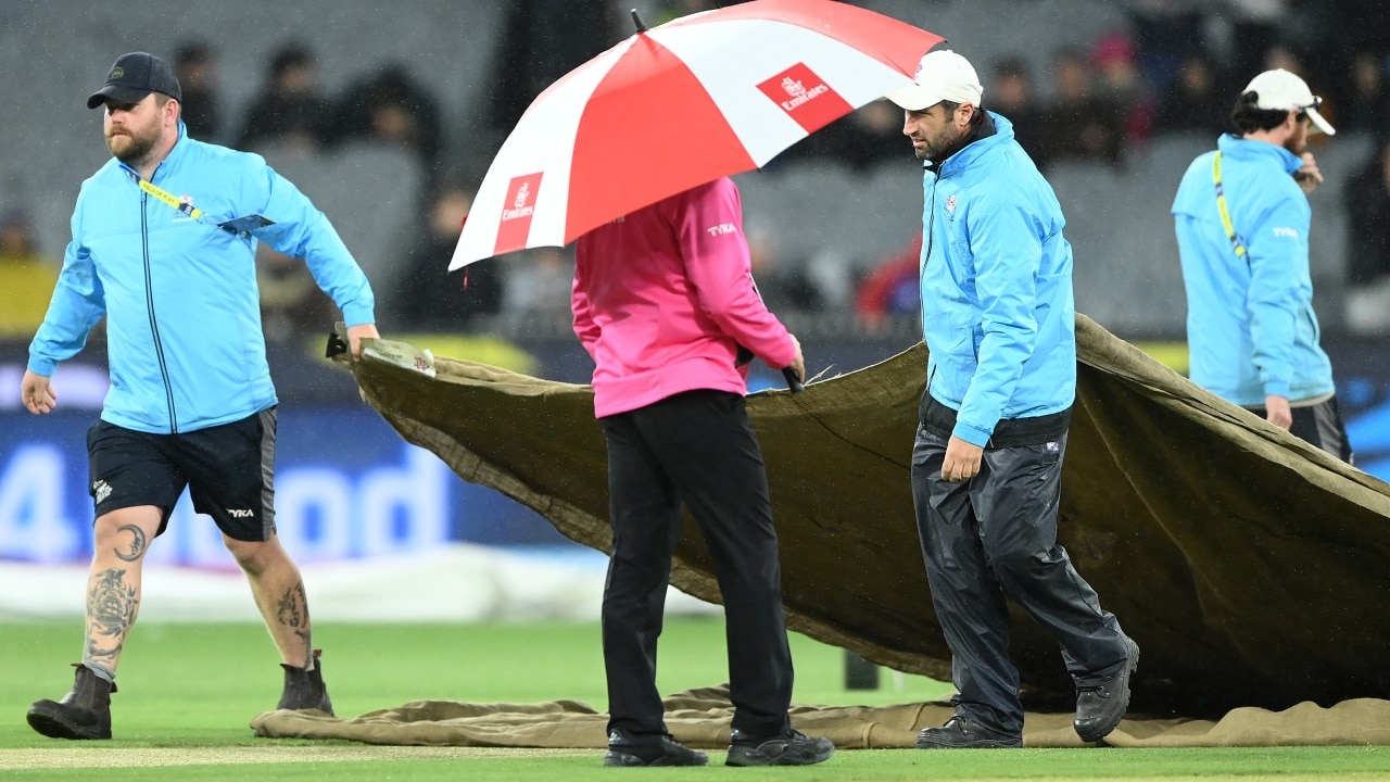 The ground staff were busy on Friday. Photo by Quinn Rooney/Getty Images