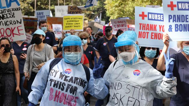 Nurses from across Sydney gathered in front of NSW Parliament today to protest staff shortages and wages. Picture: NCA NewsWire / David Swift