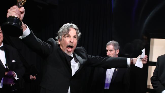 This handout photo released by A.M.P.A.S. shows Director Peter Farrelly, winner of Best Picture and Best Original Screenplay for 