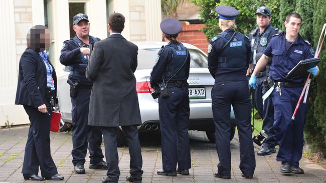 Police at the victim’s Westbourne Park home. Picture: AAP Image/ Keryn Stevens