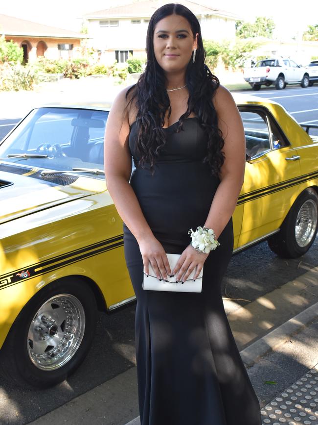 Mackenzie Vessey couldn't wait to celebrate the Mackay State High School 2021 Year 12 formal, November 16, 2021. Photo: Tara Miko and Janessa Ekert