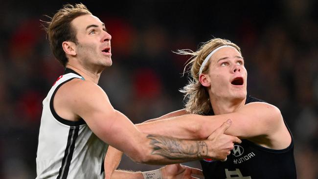 MELBOURNE, AUSTRALIA - JULY 15: Jeremy Finlayson of the Power and Tom De Koning of the Blues compete in the ruck during the 2023 AFL Round 18 match between the Carlton Blues and the Port Adelaide Power at Marvel Stadium on July 15, 2023 in Melbourne, Australia. (Photo by Morgan Hancock/AFL Photos via Getty Images)