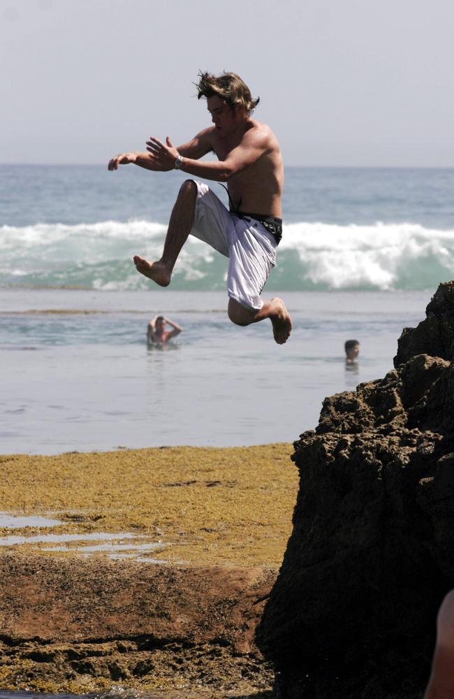 Taking the plunge at Sorrento on New Year’s Eve. Picture: Andrew Maccoll