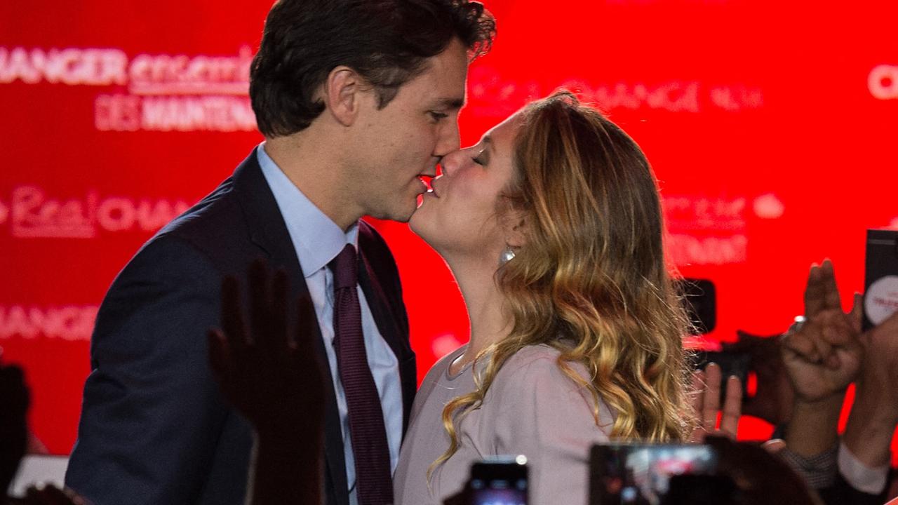 The Trudeuas won’t be doing much more kissing. (Photo by Nicholas KAMM / AFP)