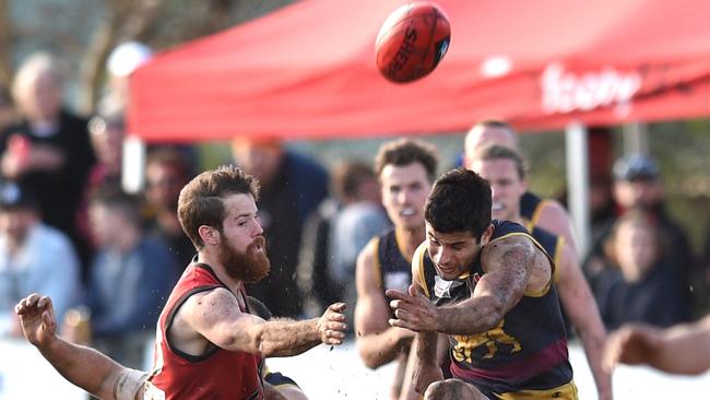 Nathan Batsanis gets a kick away for Doncaster East in the 2017 grand final. Picture: David Smith/AAP