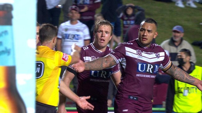 Jake Trbojevic and Addin Fonua-Blake protest with the referee Grant Atkins.