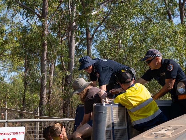 Protesters are picketing the Lee Point Defence Housing Australia Development as bulldozers move in on Stage 2 of the project. Picture: Pema Tamang Pakhrin