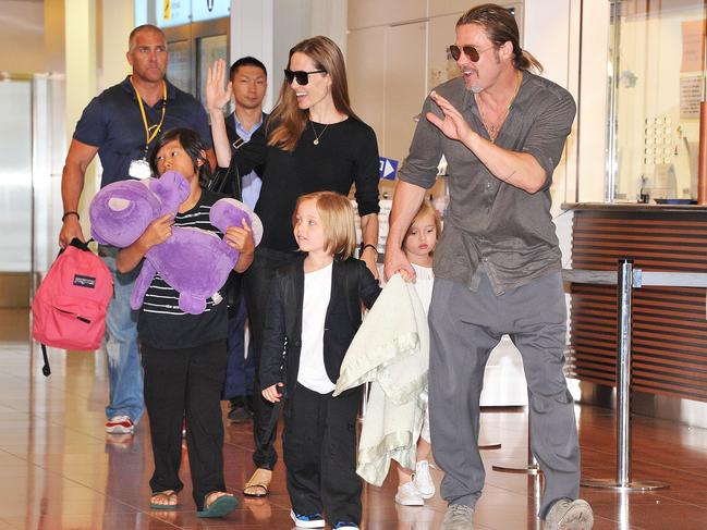 Brad Pitt, Angelina Jolie and their children Pax, Knox and Vivienne arrive at Tokyo International Airport on July 28, 2013. Picture: Getty