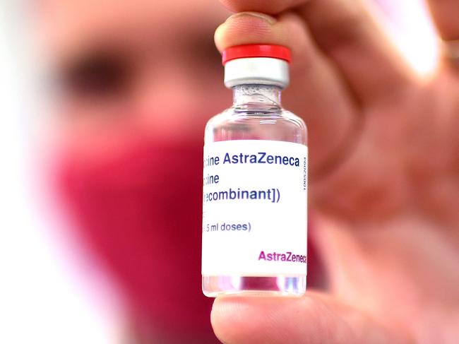 BRISBANE, AUSTRALIA - NewsWire Photos - AUGUST 8, 2021. Pharmacist Michael Thorp holds a vial of the AstraZeneca Covid-19 vaccine the at the Carina Day and Night pharmacy in Brisbane. Picture: NCA NewsWire / Dan Peled