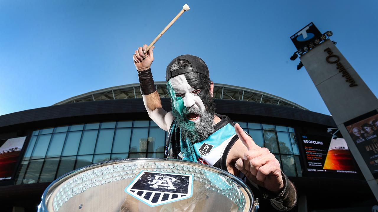 “Tealheart” aka Myles Neal, out the front of Adelaide Oval is fired up ahead of the preliminary final at Adelaide Oval. Picture: Sarah Reed