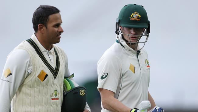 Usman Khawaja and Steve Smith. Picture: LUKE BOWDEN