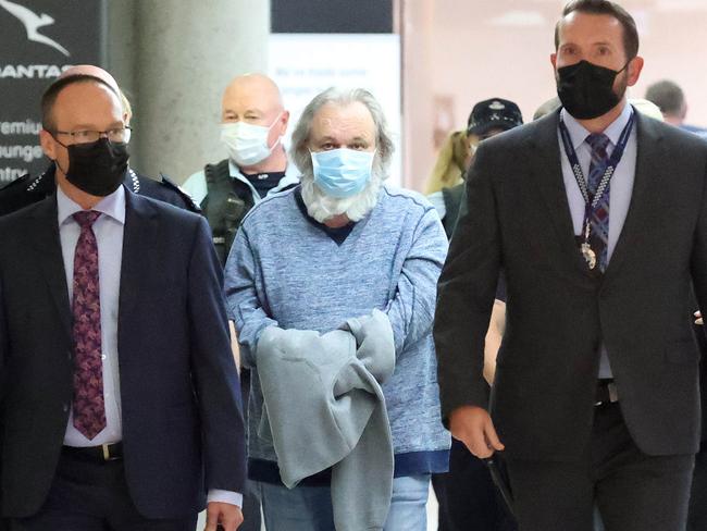 Peter Foster arriving at Brisbane Airport after being extradited from Victoria. Picture: Liam Kidston