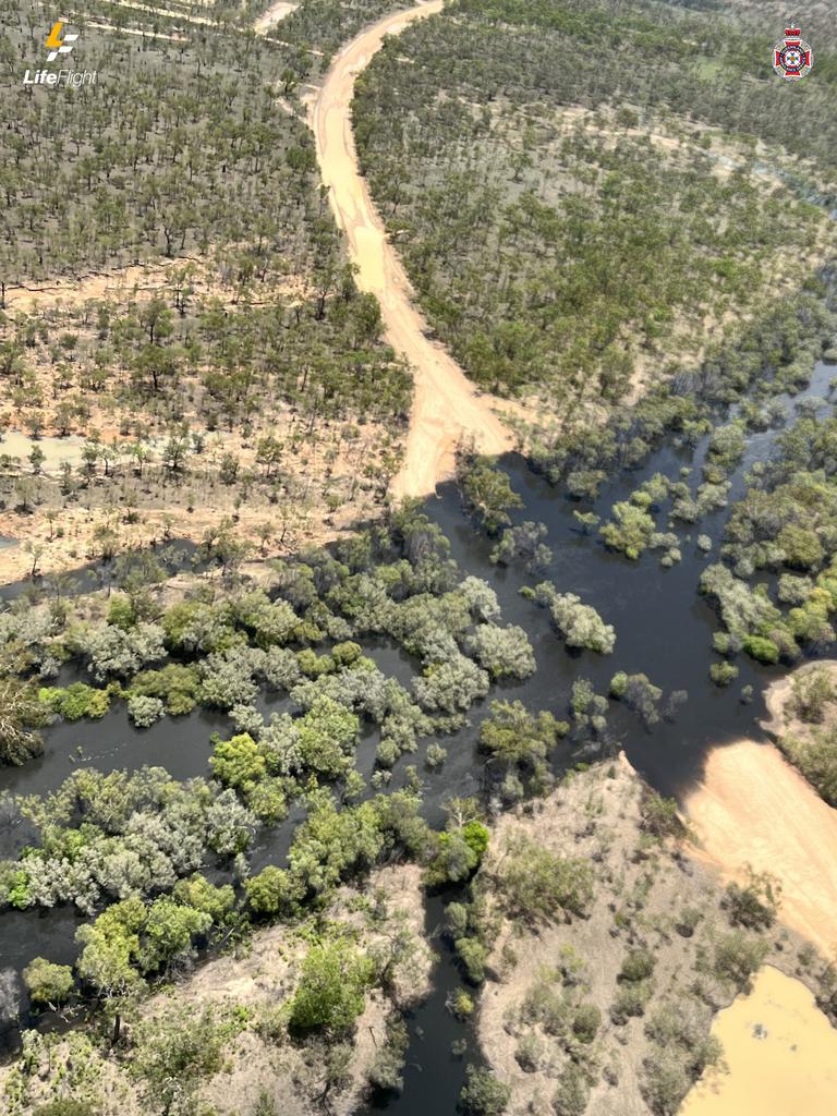 The couple were driving on the Burke Developmental Road crossing the Clark Creek when a wave of water washed their 4WD off the road. Picture: LifeFlight