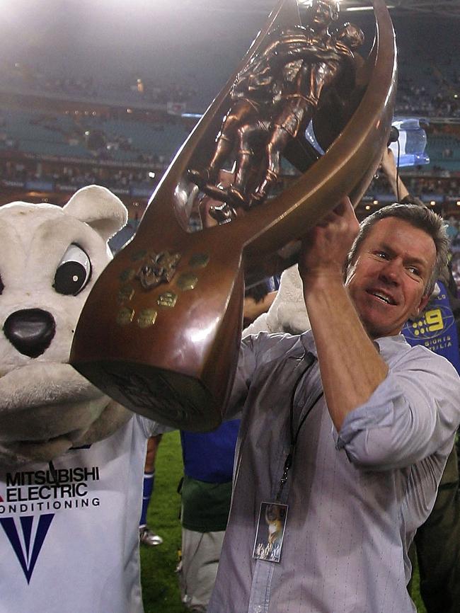 Bulldogs coach Steve Folkes celebrates following the 2004 NRL grand final. Picture: Getty Images.