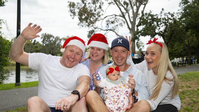 David Penzhorn, Robyn Penzhorn, Graham, Kenna, 11 weeks, and Chantelle Allan enjoy Christmas lunch on the Yarra Picture: Sarah Matray