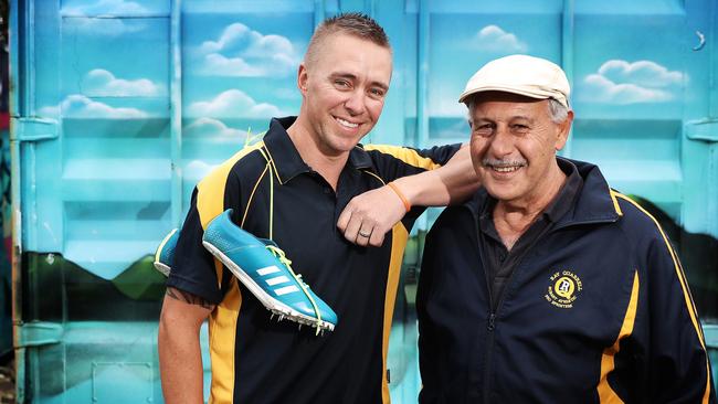 FAST TRACK TO 40: Sprinter Luke Whitney, left, with trainer Ray Quarrell, who is attending his 40th Stawell Gift this Easter weekend. Picture: LUKE BOWDEN