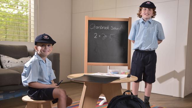 Siblings Sacha, 5, and Yanni, 7, are two of thousands of private school students going back to class this week across Sydney. Picture: Flavio Brancaleone