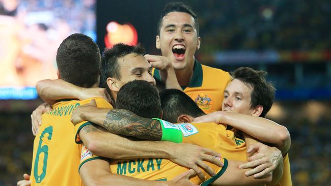 Australia's Matt McKay celebrates his goal during the Socceroos v Oman Asian Cup game at ANZ Stadium, Sydney Olympic Park. pic Mark Evans