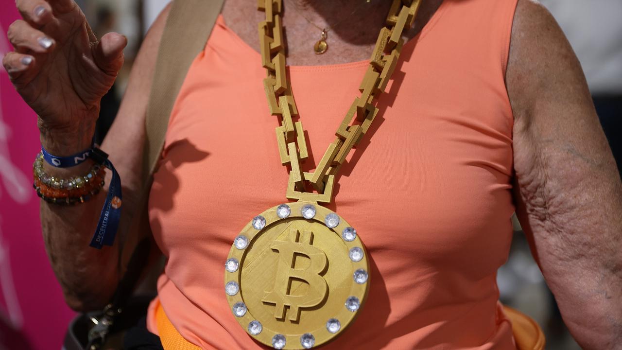 An attendee wears a necklace at the Bitcoin 2021 Convention. Picture: Joe Raedle/Getty Images/AFP