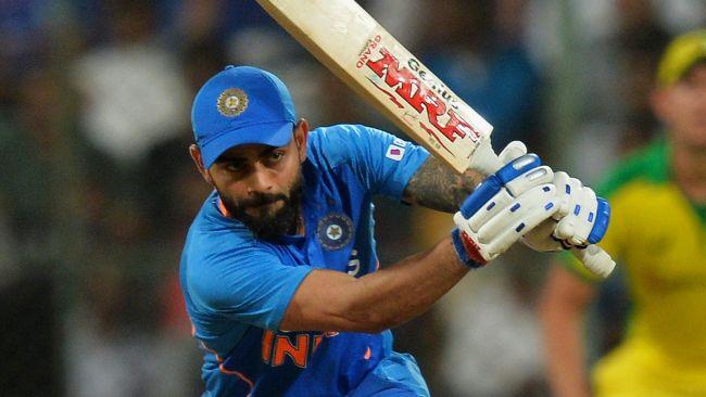 India's captain Virat Kohli plays a shot during the third and last one day international (ODI) cricket match of a three-match series between India and Australia at the M. Chinnaswamy Stadium in Bangalore on January 19, 2020. (Photo by Manjunath KIRAN / AFP) / ----IMAGE RESTRICTED TO EDITORIAL USE - STRICTLY NO COMMERCIAL USE----- / GETTYOUT