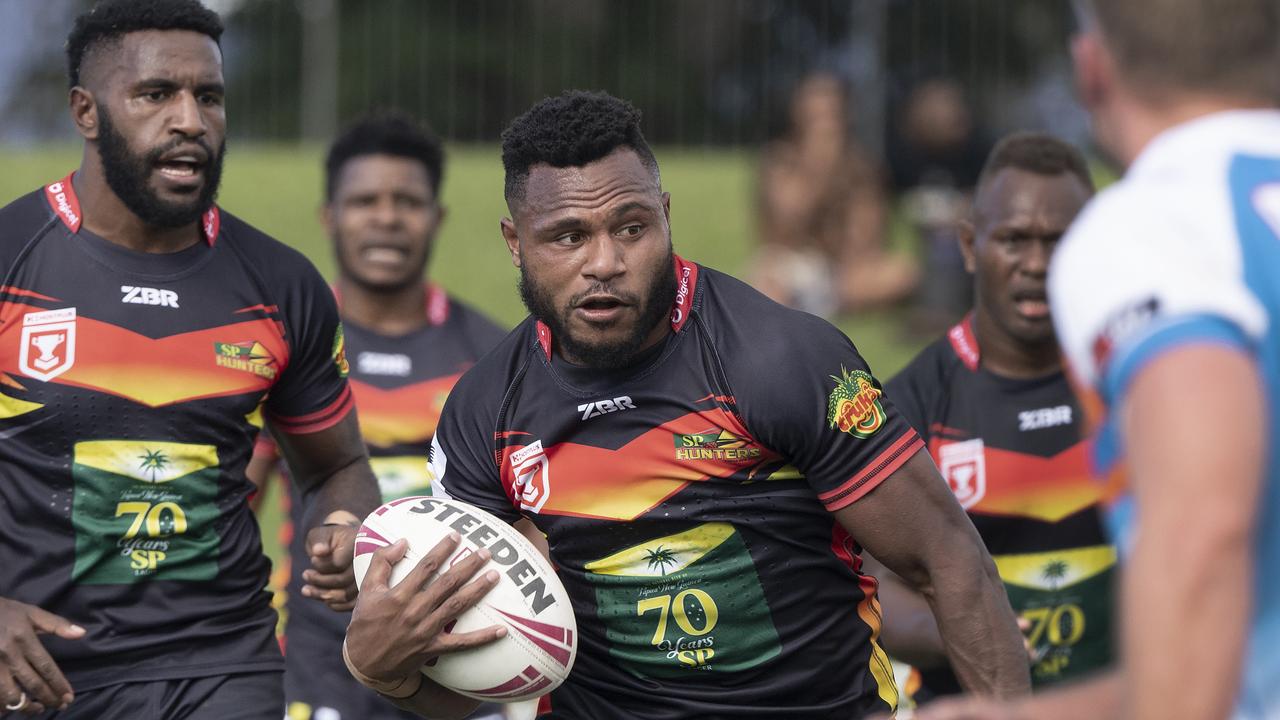 The Papua New Guinea Hunters’ Gilimo Paul attacks the line during a match against the Northern Pride at Barlow Park in Cairns. Picture: Brian Cassey