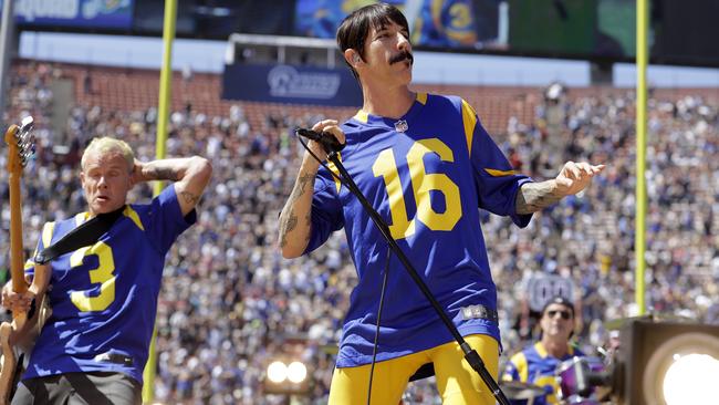 The Red Hot Chili Peppers perform prior to an NFL football game.