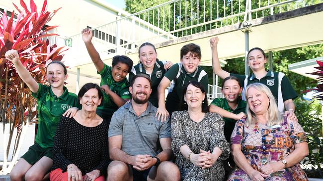 St. Joseph's Mundingburra Catholic School staff Clare Plant, Michael Feaver, Tracy Nuttall and Julie Franklin with students, Grace Norton, 11, Nathaneal Jena, 11, Piper Wilson, 10, Easton Ede, 10, Edie Parker, 12, and Evie Elton, 11, are celebrating 100 years. Picture: Shae Beplate.