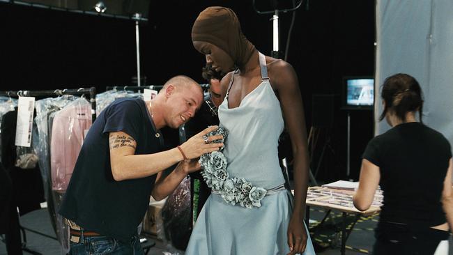 McQueen with one of his creations: ‘The shows are about what’s buried in my psyche’