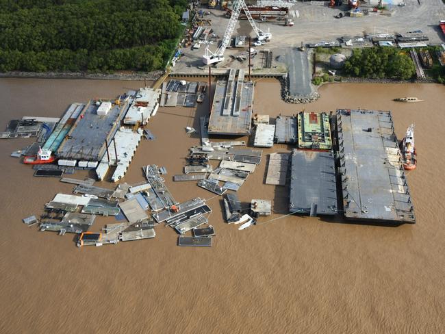 Pontoons and other flotsam on the Brisbane River in mid-January 2011