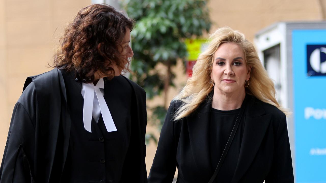 Gina Edwards (right, pictured with her barrister Sue Chrysanthou) is suing Nine News over broadcasts which she claims falsely implied she was a thief and had exploited Oscar the Cavoodle for financial benefit. Picture: NCA NewsWire / Damian Shaw