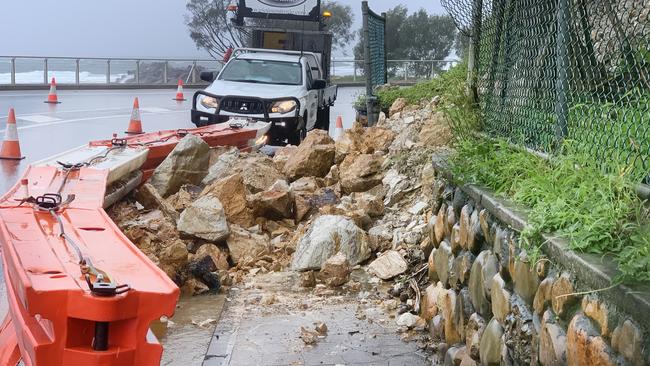 A landslide at Kirra Hill Coolangatta has caused a lane of traffic to be blocked when debris crashed through fencing and onto the road way. NCA NewsWire / Scott Powick