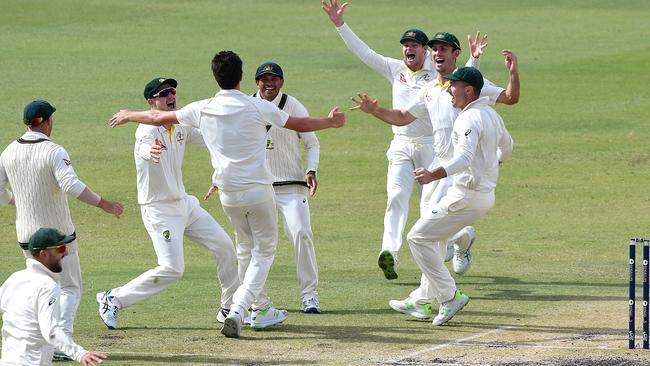 Australian players celebrate after regaining the Ashes. Picture: AAP