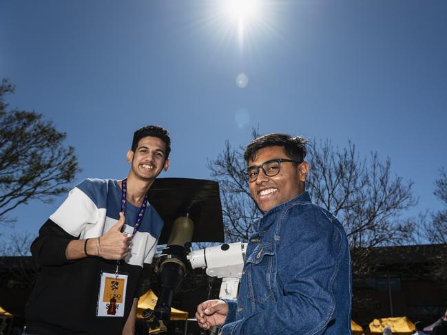 Anshul Vasishth (left) and Adhith Sivaharen after looking at the sun through a telescope at the iLAuNCH Space family fun day, part of UniSQ's Open Day, Sunday, August 18, 2024. Picture: Kevin Farmer