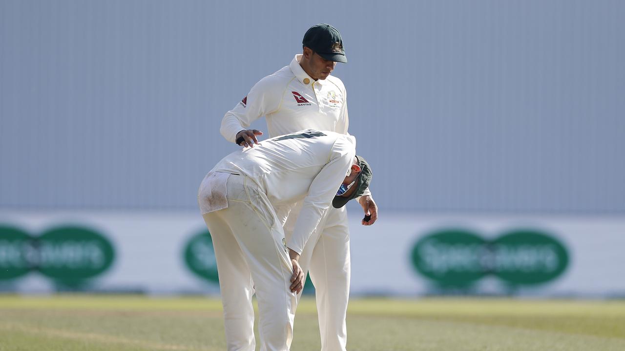 Usman Khawaja consoles Nathan Lyon as the third Test slipped away.