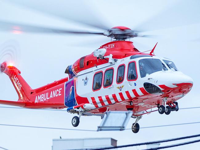An Air Ambulance helicopter, lands on the helipad at The Alfred hospital, Commercial Road, Prahran. Ambulance Victoria, HEMS, Helicopter Emergency Medical Service. Picture: Mark Stewart
