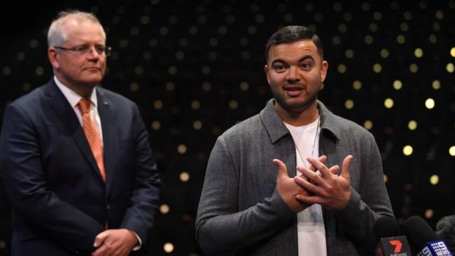 Prime Minister Scott Morrison and singer Guy Sebastian last June. Pic: AAP Image/Joel Carrett