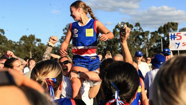 EFNL 2024: South Croydon’s Taylah Black celebrates this year’s premiership. Picture: Davis Harrigan