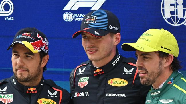 Sergio Perez, Max Verstappen and Alonso after the qualifying session for the Formula One Chinese Grand Prix on Saturday. (Photo by Pedro Pardo / AFP)