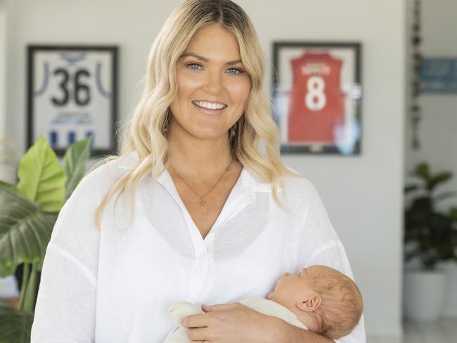 Diamonds netball star Gretel Bueta with new baby Toby, husband Niko and son Bobby, 2, is the new face of the DrinkWise campaign.