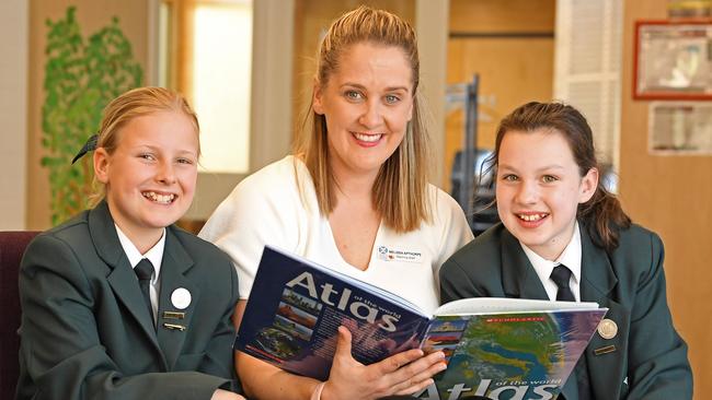 Seymour College teacher Melissa Apthorpe with Year 5 students Rose and Sophie. Picture: Tom Huntley